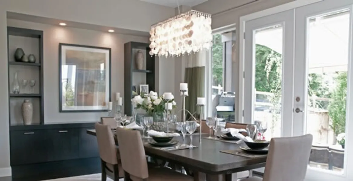 Elegant dining room chandelier installation above table in Mountain View, CA