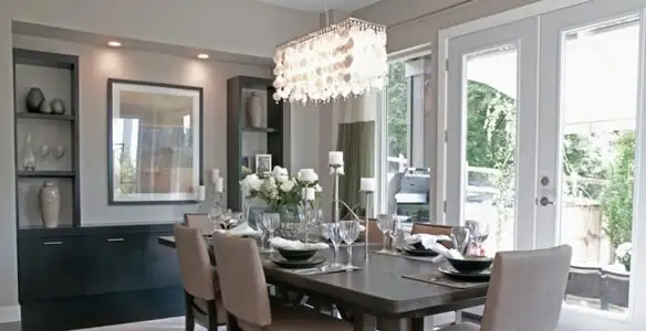 Elegant dining room chandelier installation above table in Mountain View, CA