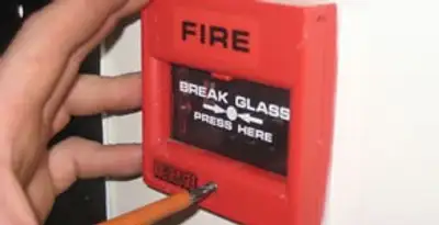 fire alarm installation service showing manual fire alarm pull station installed by licensed electricians in Mountain View, CA