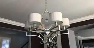 Modern chandelier installation with multiple light fixtures in Mountain View, CA